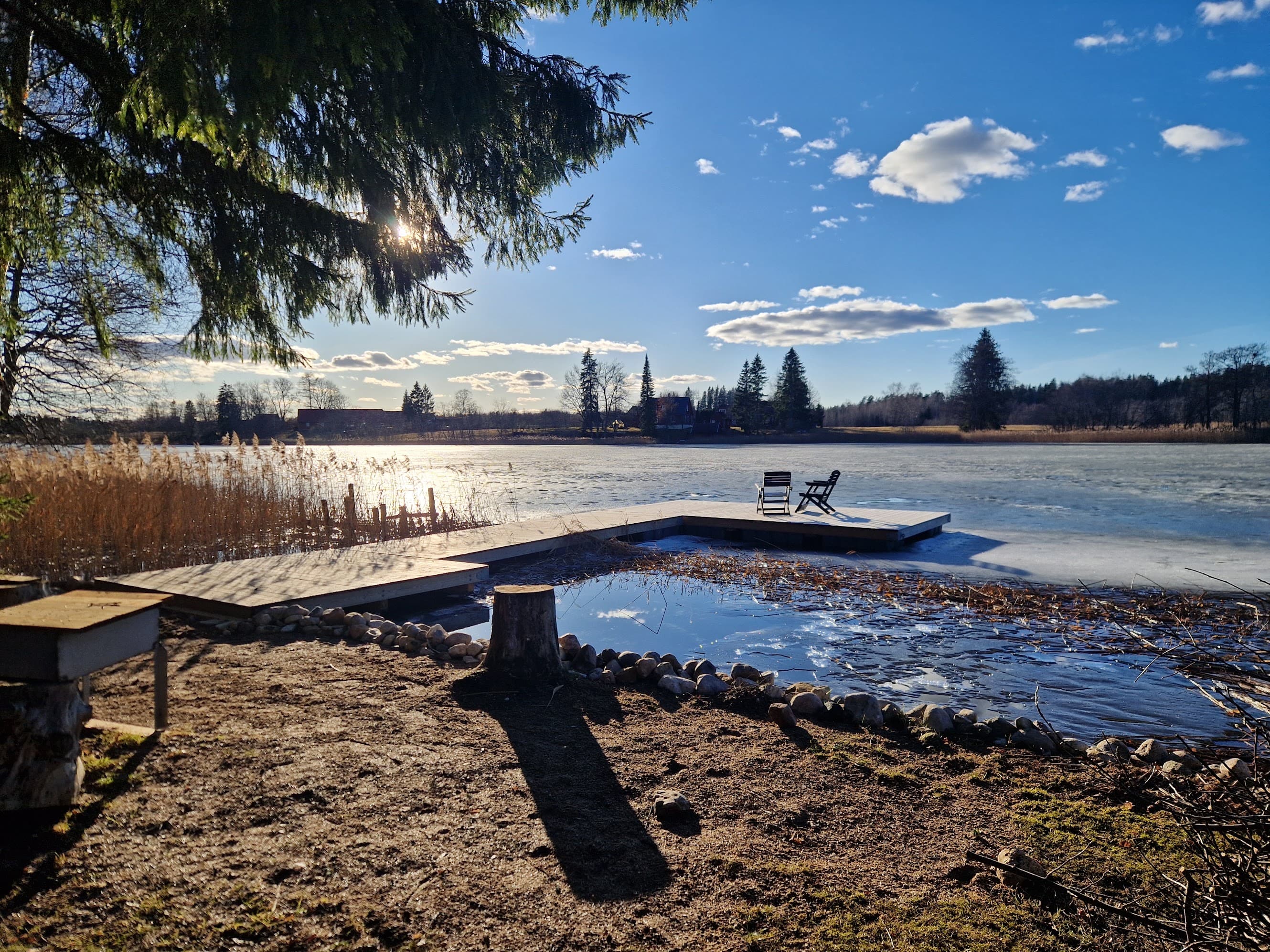 Frozen Lake Nõuni and the dock in winter